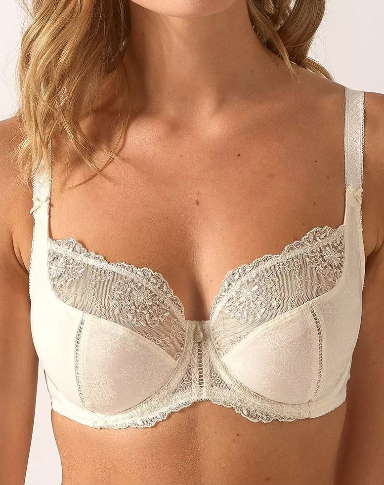 White lace bra on a model with a plain background