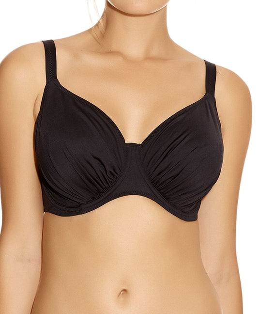 Black bikini worn by a model on a white background