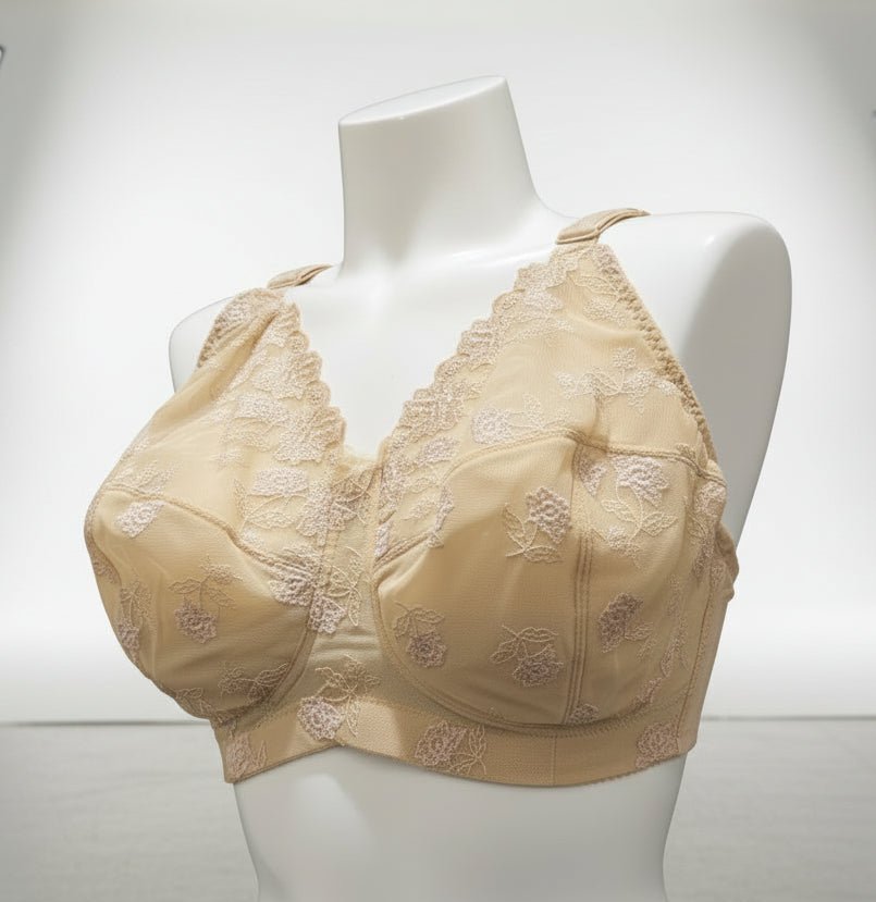 Beige lace bra on a mannequin bust