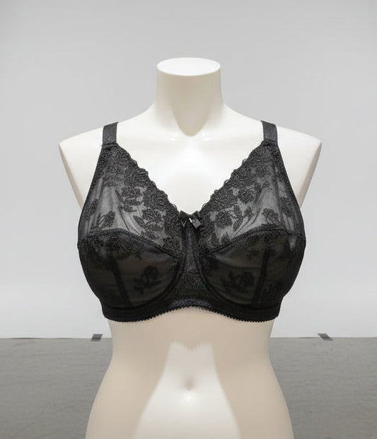 Black lace garment on a mannequin bust