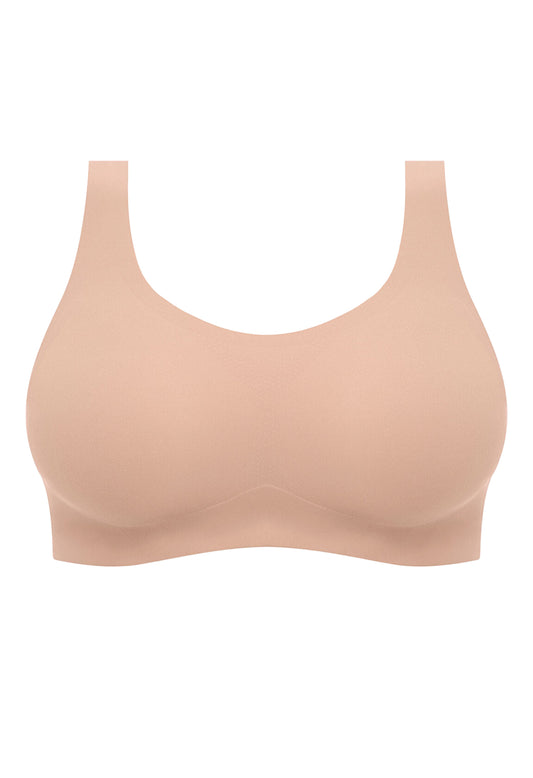 Beige bralette on a white background