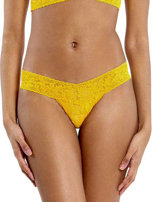 Yellow lace bikini set on a white background