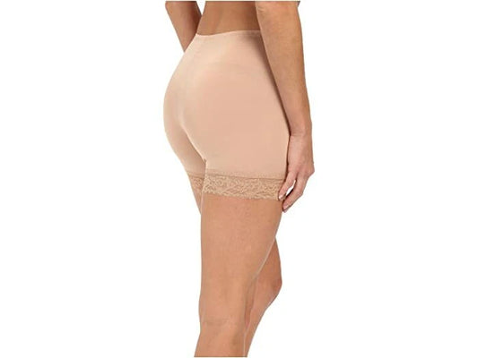 Beige shapewear with lace trim on a white background