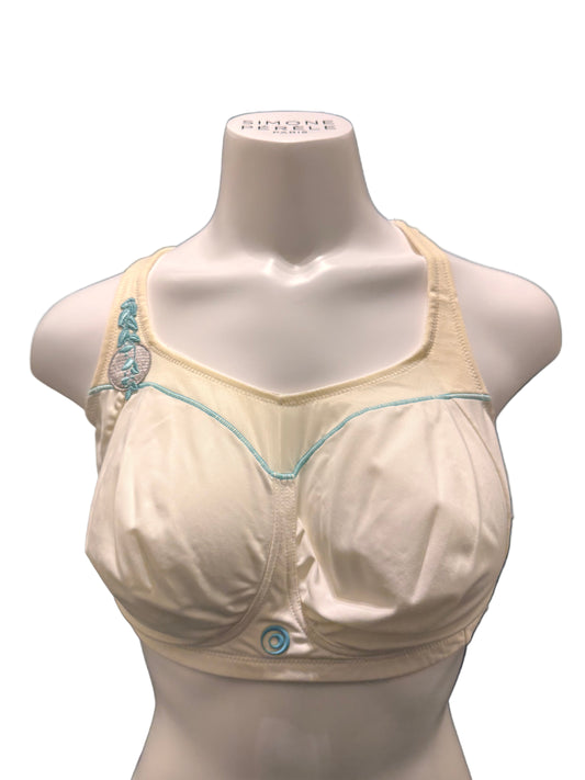 Beige bra with blue accents on a mannequin against a dark background