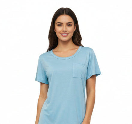 Light blue top and green pj patterned pants on a mannequin against a white background