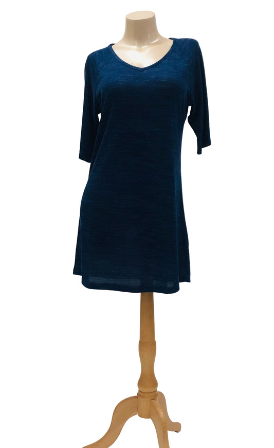 Navy blue dress on a mannequin against a white background