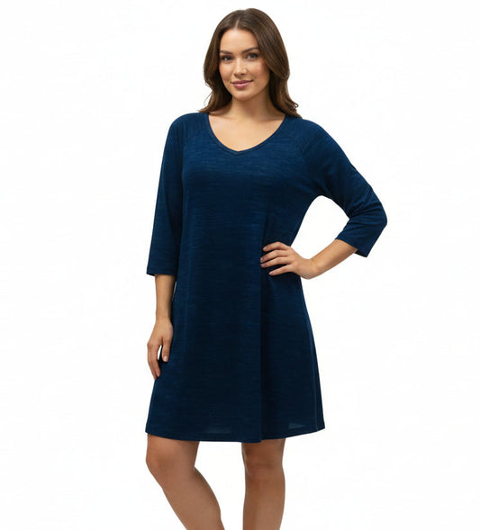 Navy blue dress on a mannequin against a white background