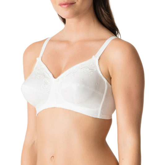 White bra worn by a model on a plain background