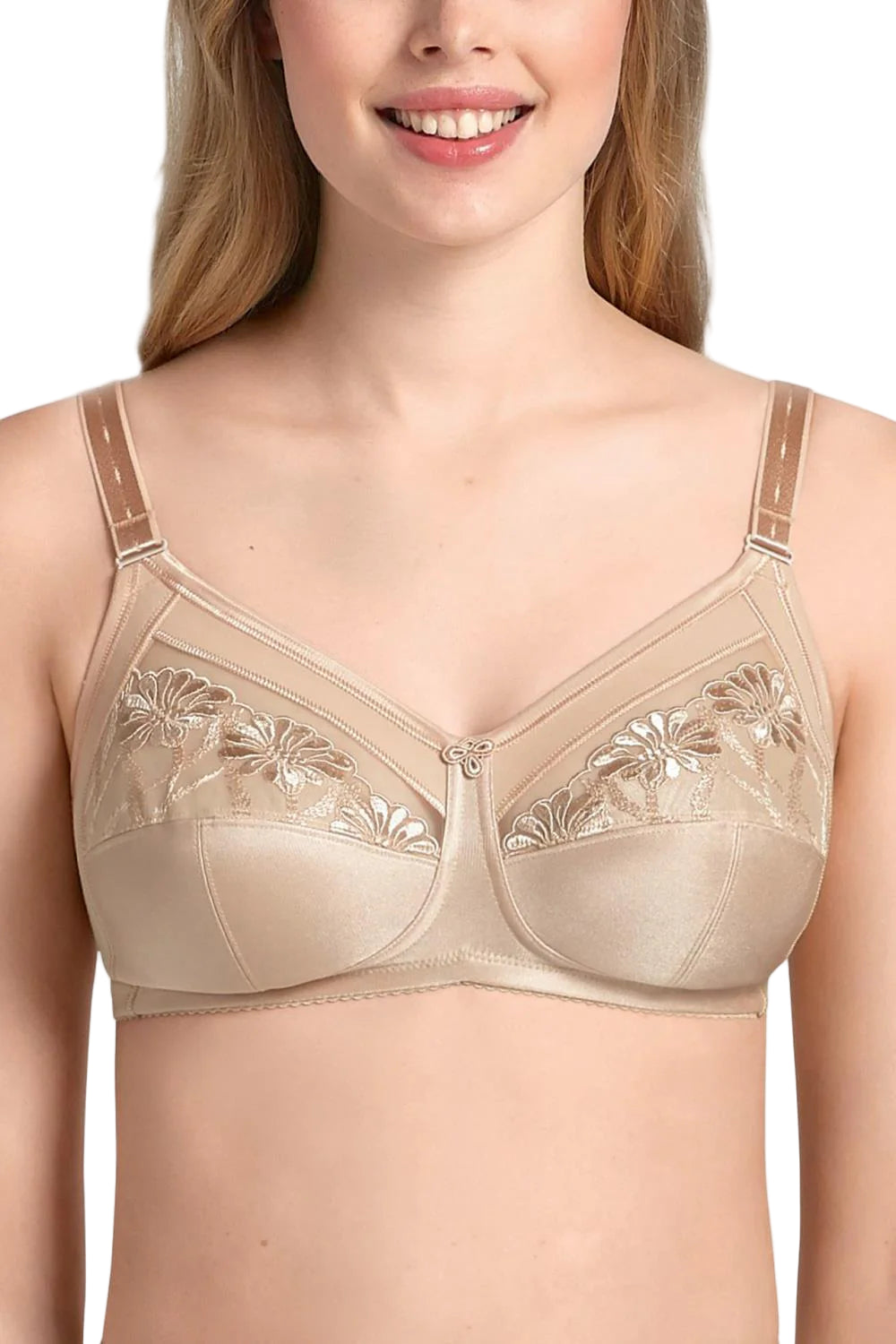 Beige bra with floral lace details worn by a model on a white background