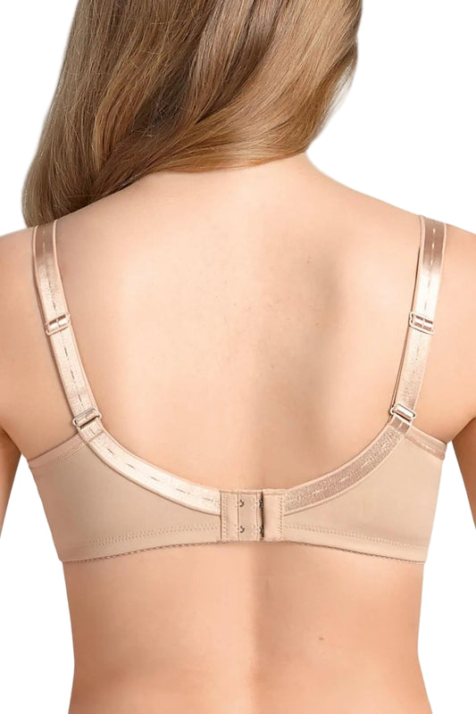 Beige bra worn by a model on a white background