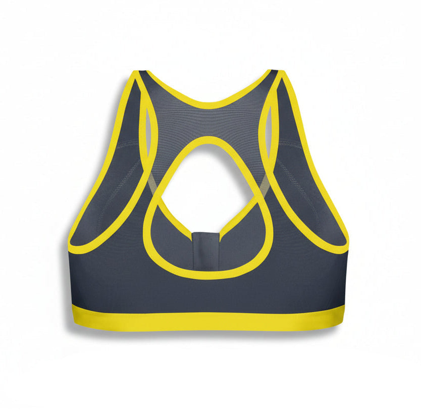 Gray sports bra with yellow accents on a white background