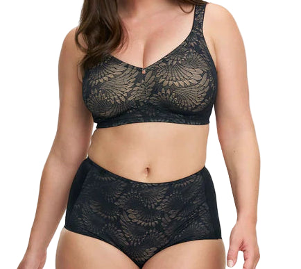 Woman wearing a black lace lingerie set on a white background