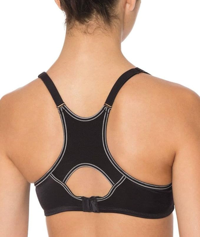 Black sports bra with cut-out design on a white background