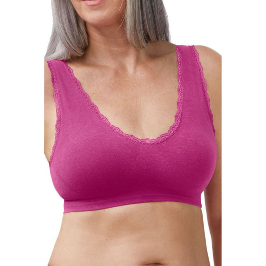 Woman wearing magenta bralette