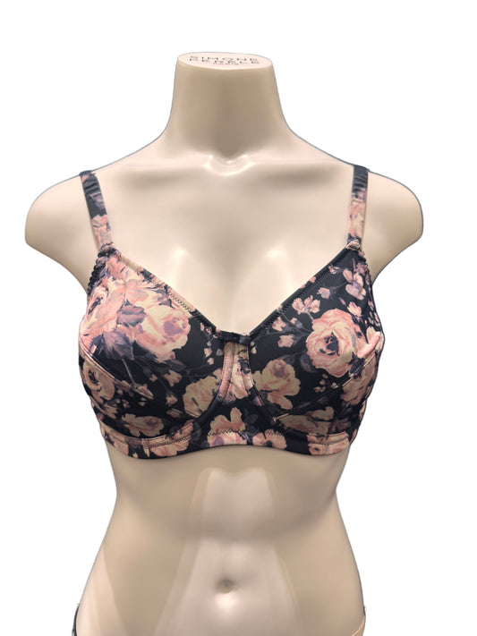 Floral-patterned bra on a mannequin against a dark background