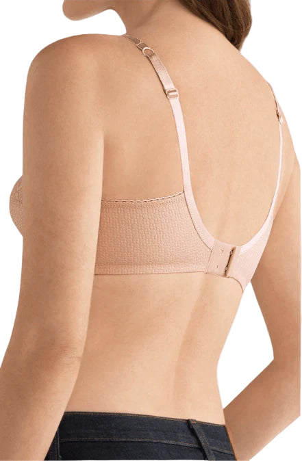 Beige shapewear worn by a person on a white background