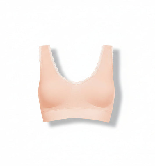 Nude-colored bralette on a white background