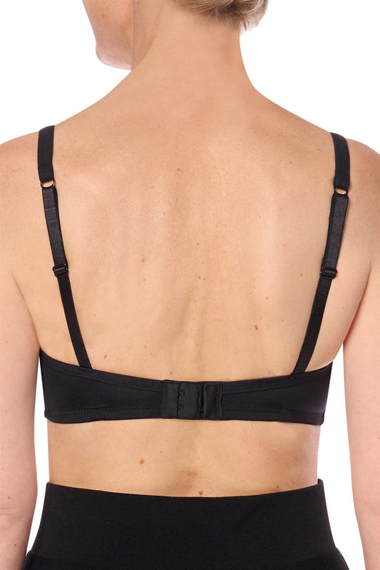 Black bra worn by a person on a white background