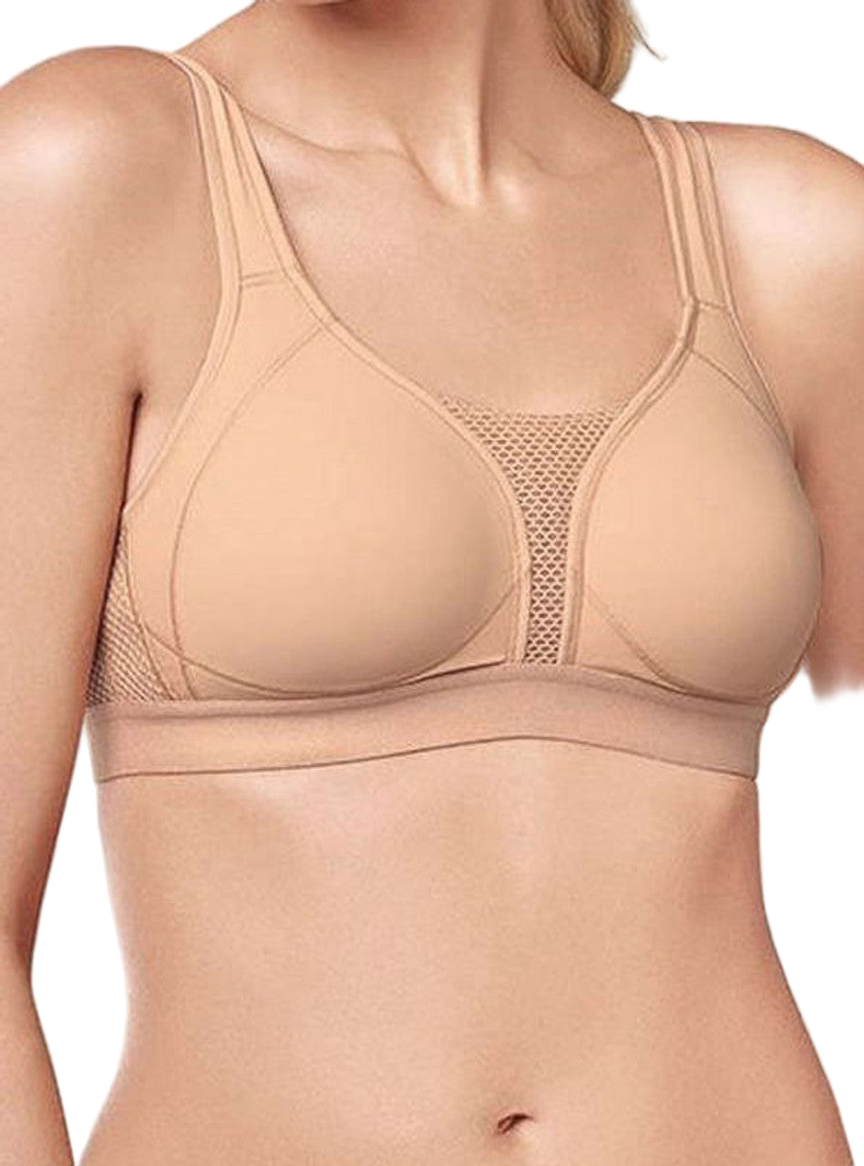 Beige bra worn by a model on a plain background