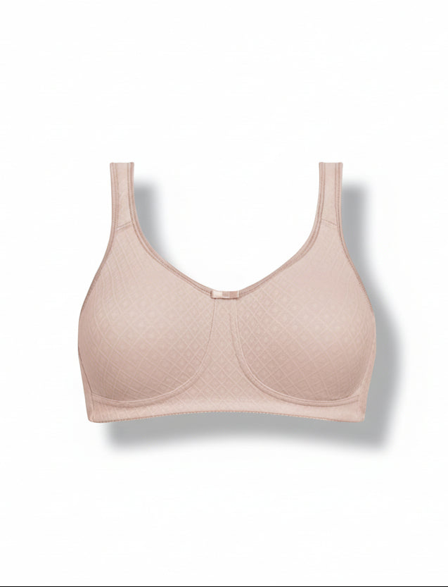 Beige bra on a white background
