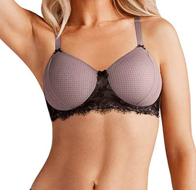 Woman wearing a purple lace bra and panties set on a white background