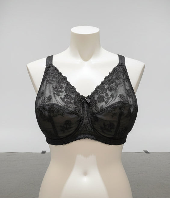 Black lace garment on a mannequin bust
