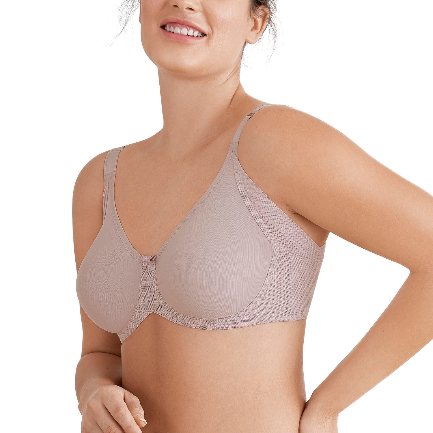 Woman wearing a beige bra on a white background