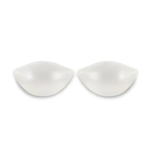 Two white bra pads on a white background