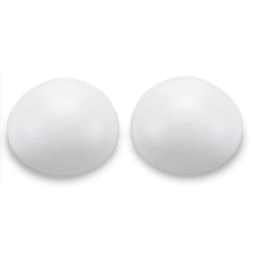 Two white circular shapers on a white background