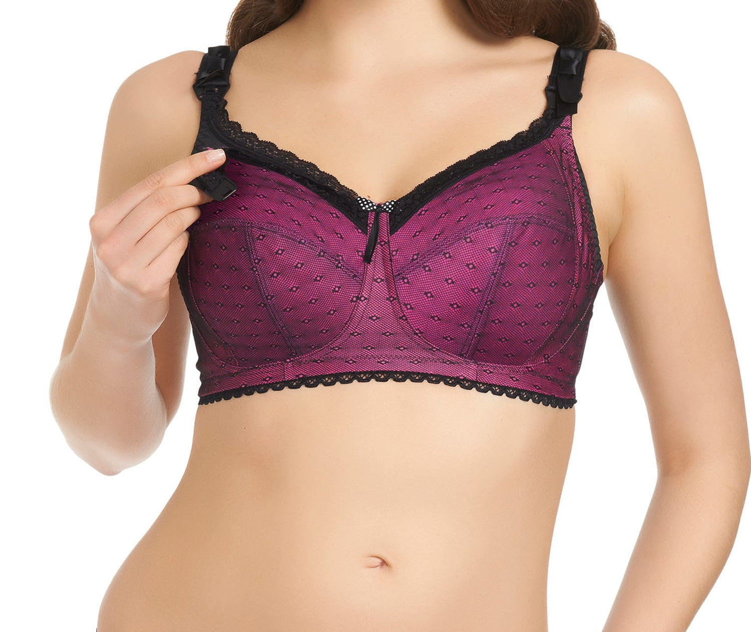 Woman wearing a purple lace bralette on a white background