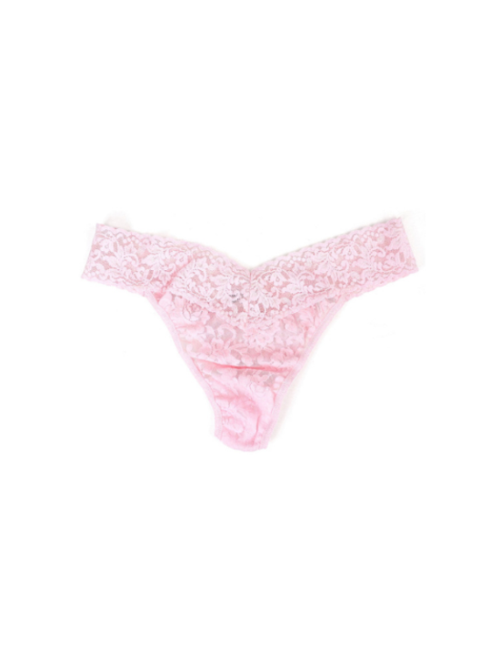 Pink lace thong on a white background