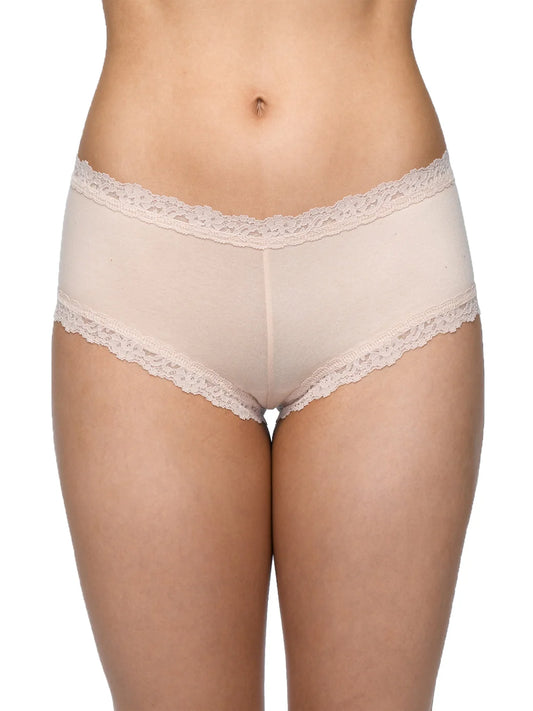 Beige lace-trimmed underwear on a white background