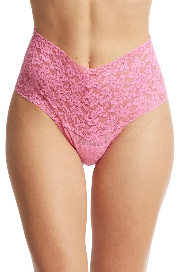 Pink lace underwear on a white background