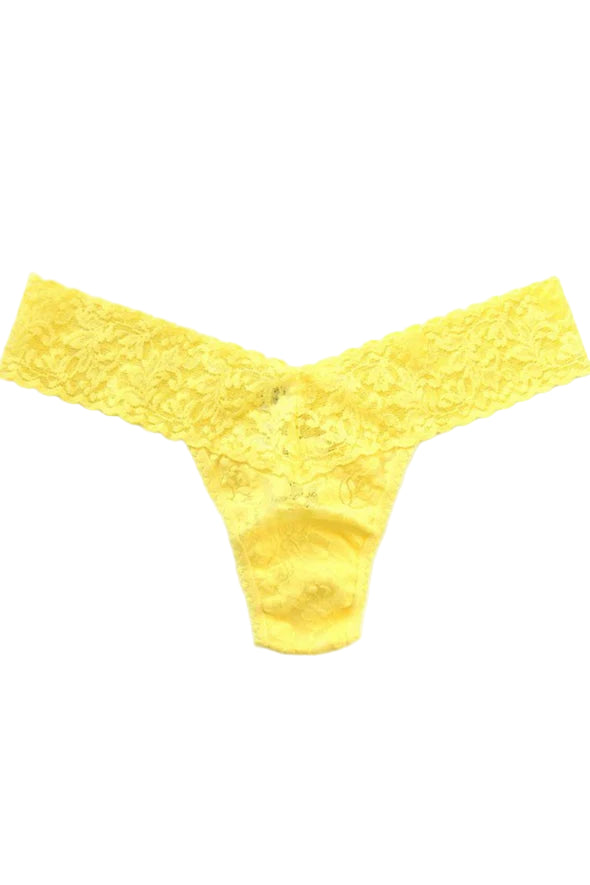 Yellow lace thong on a white background
