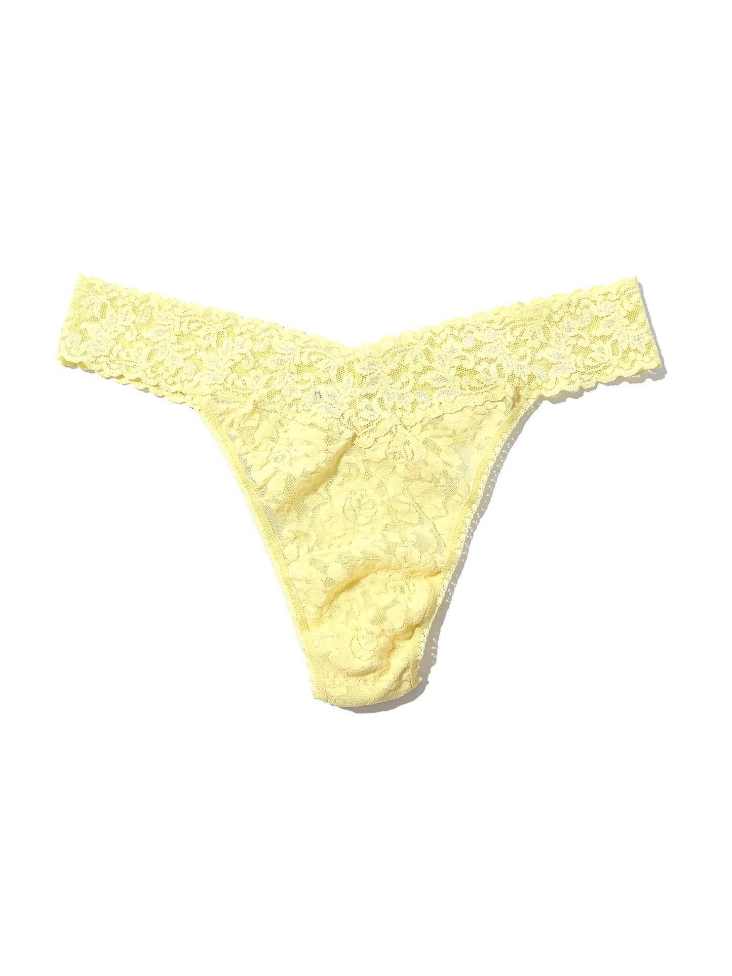 Yellow lace thong on a white background