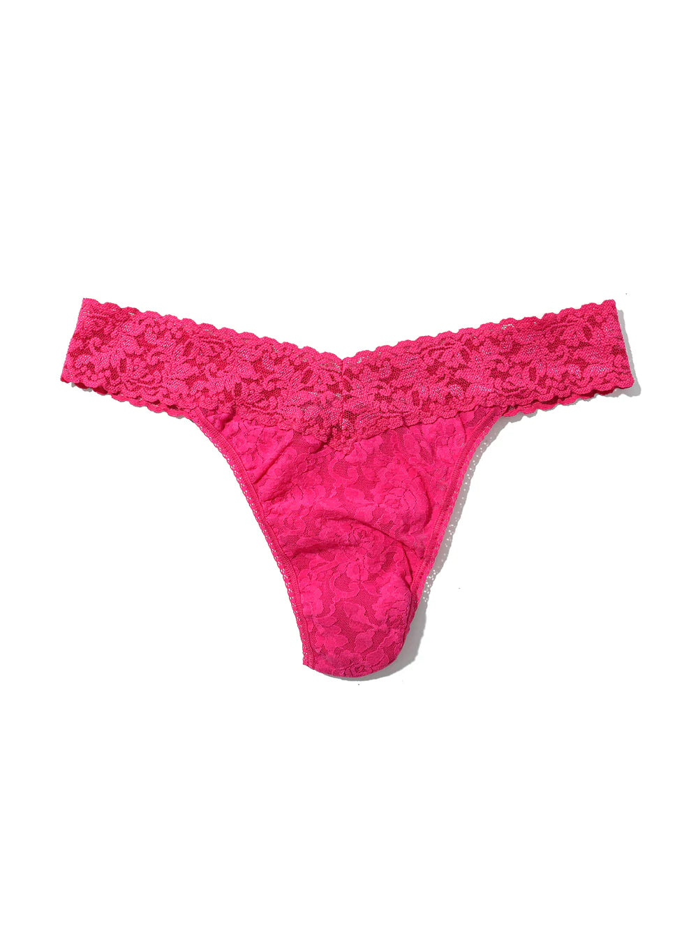 Pink lace thong on a white background