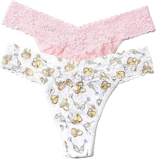 Set of women's underwear with pink lace top and gold and clear design on white background