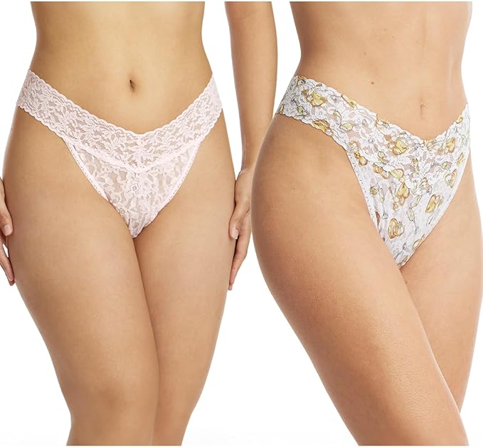 Two pairs of lace underwear on a white background