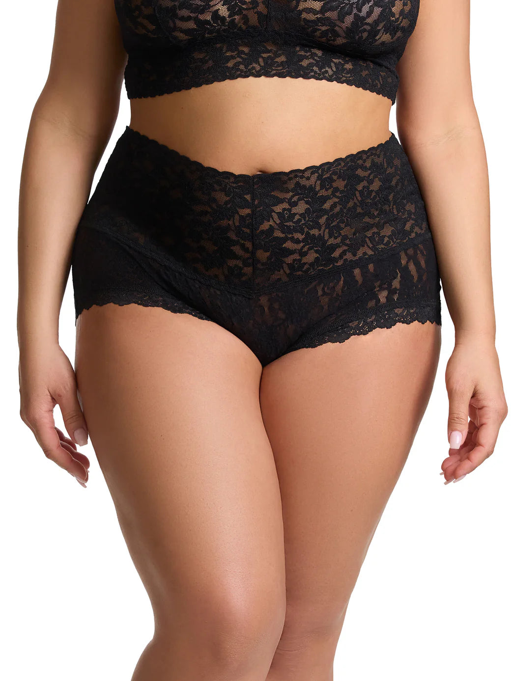 Black lace lingerie set on a white background