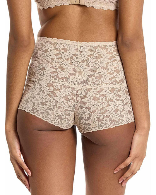 Lace underwear set worn by a model on a white background