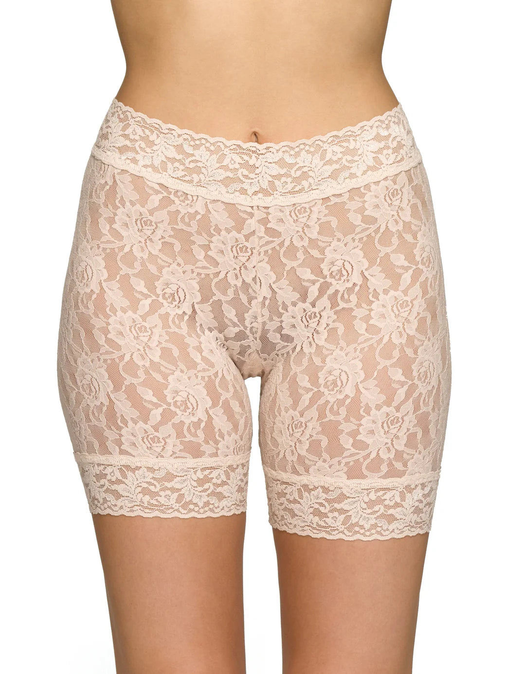 Beige lace shorts on a white background