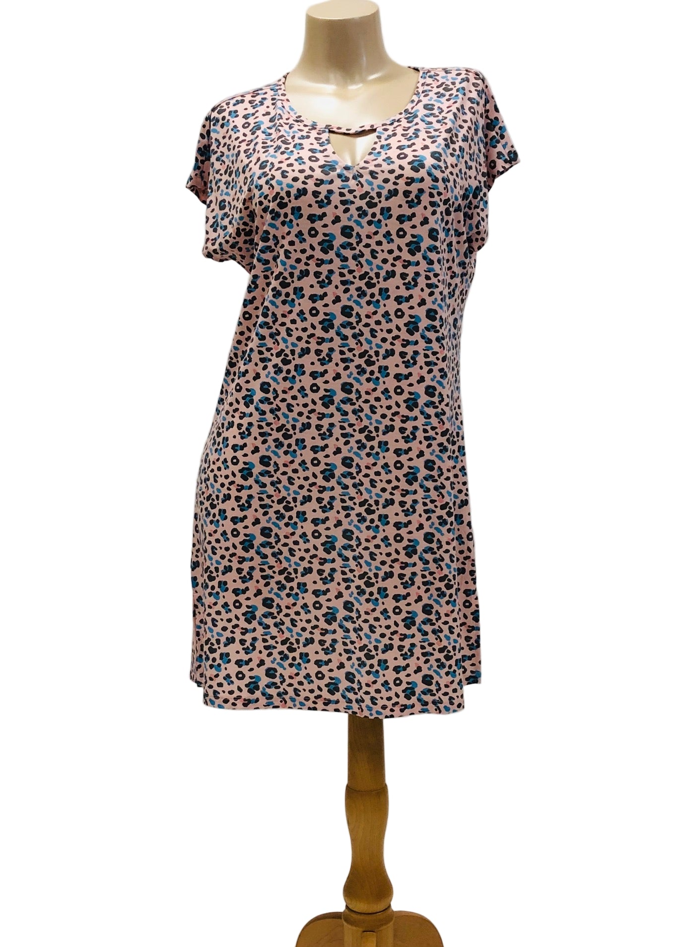 Sleepshirt with a cheetah pattern on a mannequin against a plain background