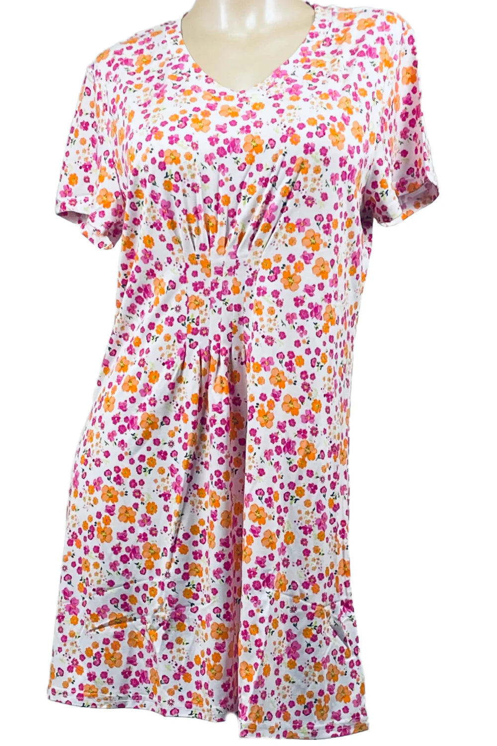 Floral patterned dress on a white background