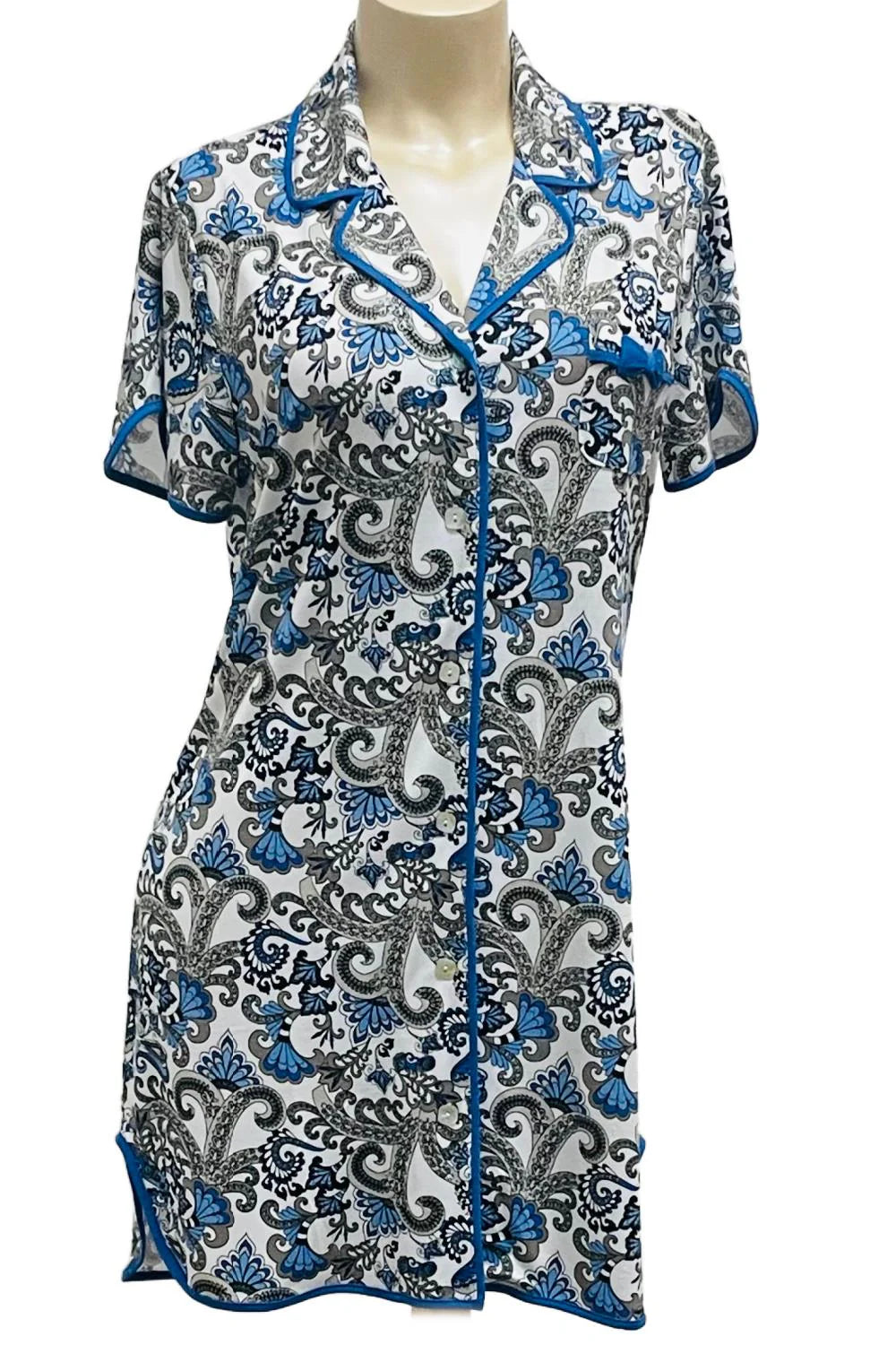 Patterned shirt on a mannequin against a white background