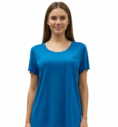 Mannequin wearing a blue top and floral pajama pants on a white background