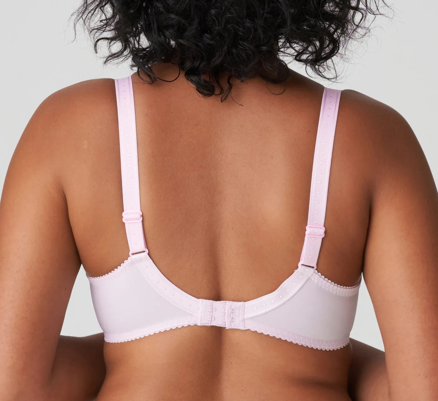 The back of the Orlando PrimaDonna Bra in the Sweet violet color. The colour is light pink with tones of yellow