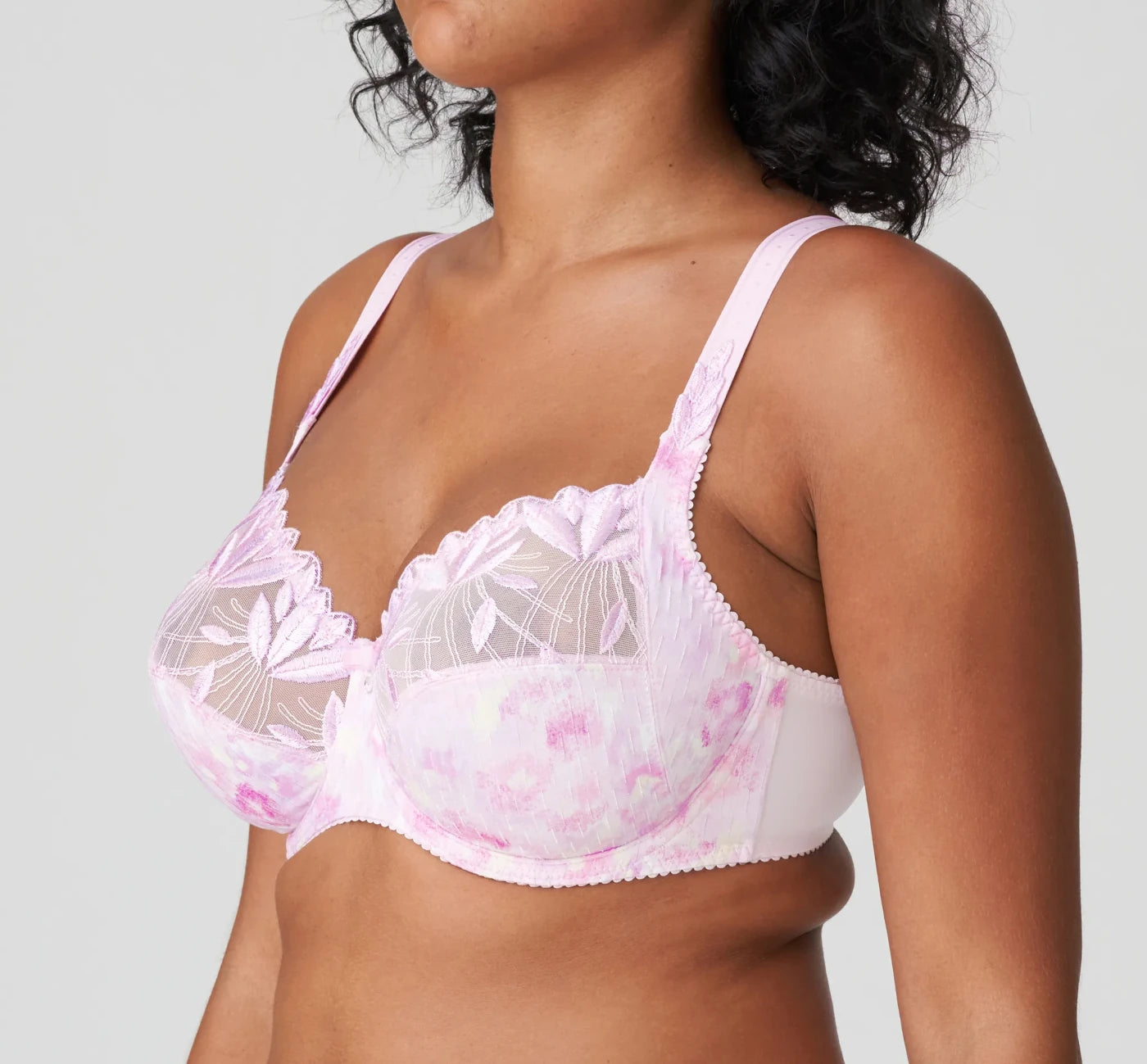 Side view of the Orlando PrimaDonna Bra in the Sweet violet color. The colour is light pink with tones of yellow