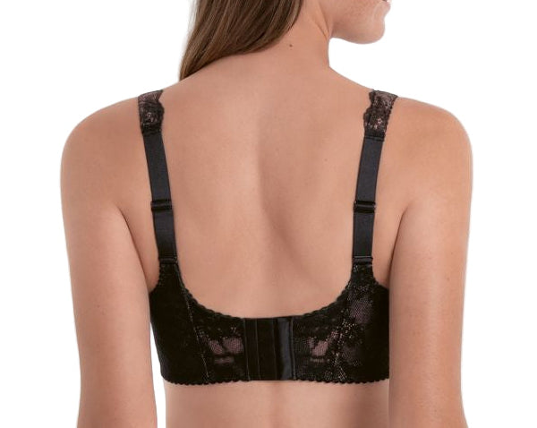 Black lace bra worn by a model on a white background