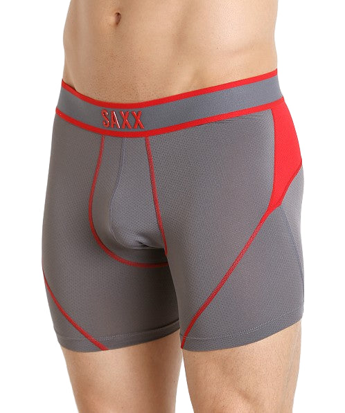 Gray boxer briefs with red accents featuring the SAXX brand on a light gray background.