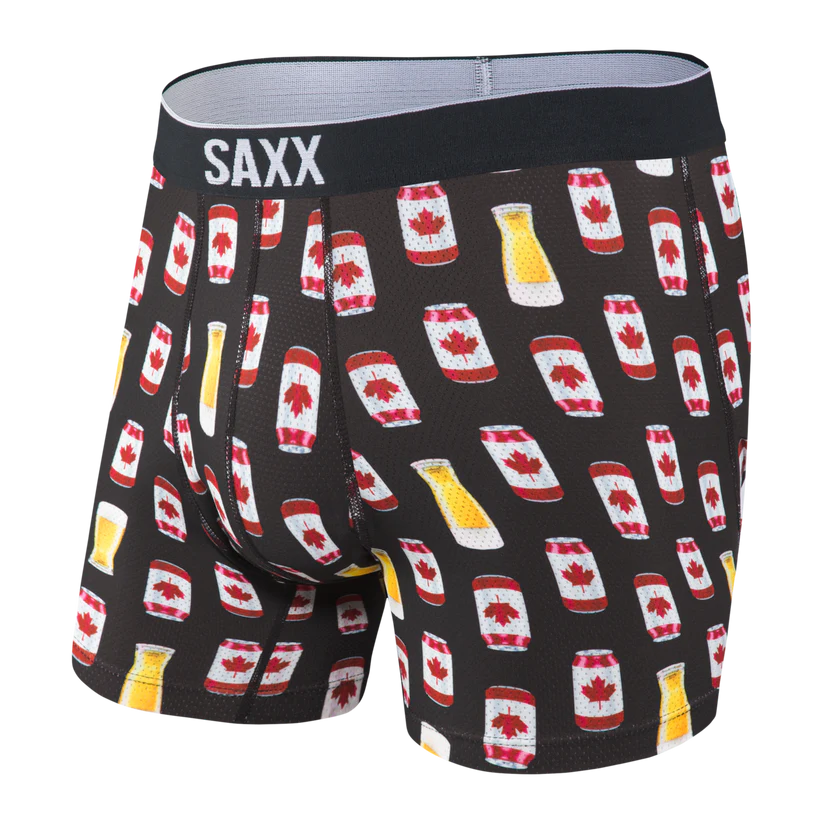 Boxer briefs with Canadian flag pattern and SAXX branding on a black background